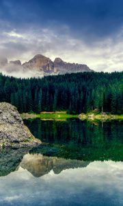 Preview wallpaper lake, stone, block, middle, surface of the water, mountains, wood, coniferous