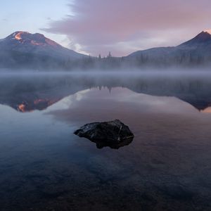 Preview wallpaper lake, stone, fog, mountains, reflection, landscape