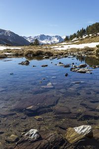 Preview wallpaper lake, stones, bottom, mountains, landscape