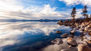 Preview wallpaper lake, stones, day, water, transparent, blue sky, reflection