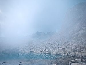 Preview wallpaper lake, stones, fog, rocks
