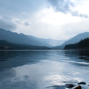 Preview wallpaper lake, stones, hills, distance