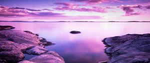 Preview wallpaper lake, stones, landscape, shore, clouds, purple