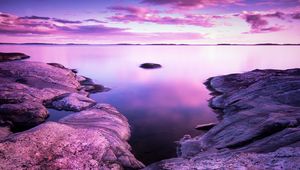 Preview wallpaper lake, stones, landscape, shore, clouds, purple