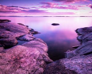 Preview wallpaper lake, stones, landscape, shore, clouds, purple