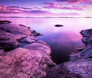 Preview wallpaper lake, stones, landscape, shore, clouds, purple