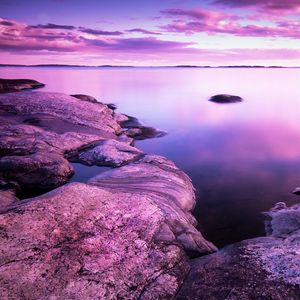 Preview wallpaper lake, stones, landscape, shore, clouds, purple