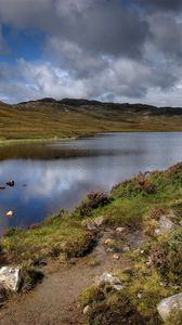 Preview wallpaper lake, stones, sky, scotland, bad weather