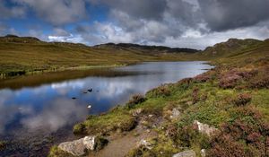 Preview wallpaper lake, stones, sky, scotland, bad weather