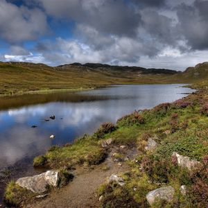 Preview wallpaper lake, stones, sky, scotland, bad weather