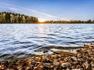 Preview wallpaper lake, stones, trees, sun, horizon