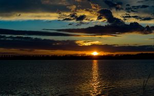 Preview wallpaper lake, sunset, clouds, dusk, dark, ripples