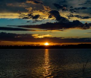 Preview wallpaper lake, sunset, clouds, dusk, dark, ripples