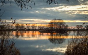 Preview wallpaper lake, sunset, grass, reflection