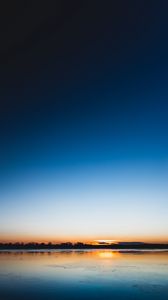 Preview wallpaper lake, sunset, horizon, distant, twilight, clear sky