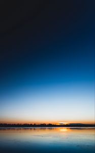 Preview wallpaper lake, sunset, horizon, distant, twilight, clear sky