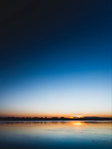 Preview wallpaper lake, sunset, horizon, distant, twilight, clear sky