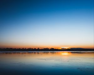 Preview wallpaper lake, sunset, horizon, distant, twilight, clear sky