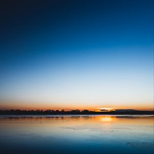 Preview wallpaper lake, sunset, horizon, distant, twilight, clear sky