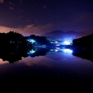 Preview wallpaper lake, town, stars, lights, home, night