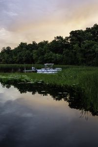 Preview wallpaper lake, trees, boat, twilight, landscape