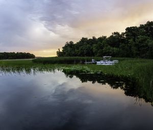 Preview wallpaper lake, trees, boat, twilight, landscape