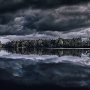 Preview wallpaper lake, trees, horizon, reflection, clouds, dark, overcast