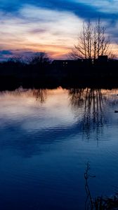 Preview wallpaper lake, trees, silhouettes, sunset, clouds, nature, dark