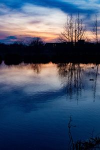 Preview wallpaper lake, trees, silhouettes, sunset, clouds, nature, dark