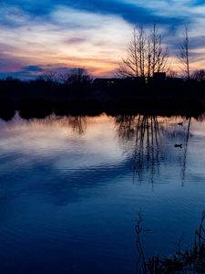 Preview wallpaper lake, trees, silhouettes, sunset, clouds, nature, dark