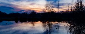 Preview wallpaper lake, trees, silhouettes, sunset, clouds, nature, dark