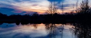 Preview wallpaper lake, trees, silhouettes, sunset, clouds, nature, dark