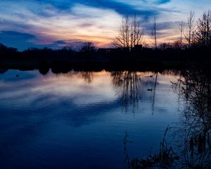 Preview wallpaper lake, trees, silhouettes, sunset, clouds, nature, dark