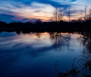 Preview wallpaper lake, trees, silhouettes, sunset, clouds, nature, dark