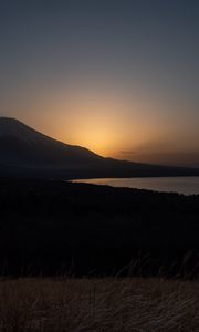 Preview wallpaper lake, volcano, grass, nature, dark