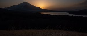 Preview wallpaper lake, volcano, grass, nature, dark