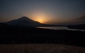 Preview wallpaper lake, volcano, grass, nature, dark