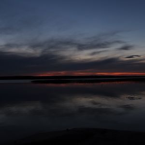 Preview wallpaper lake, water, clouds, sunset, sky, reflection, dark