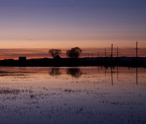 Preview wallpaper lake, water, houses, sunset, dark