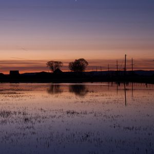 Preview wallpaper lake, water, houses, sunset, dark