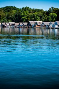 Preview wallpaper lake, water, houses, roofs, trees