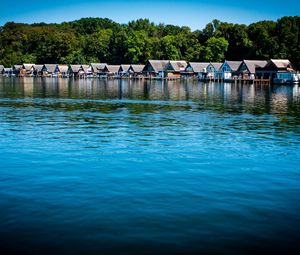 Preview wallpaper lake, water, houses, roofs, trees