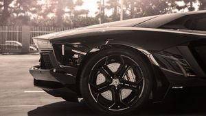 Preview wallpaper lamborghini, aventador, black, wheel, drive, sun