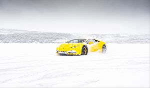 Preview wallpaper lamborghini aventador, lamborghini, yellow, winter, snow, sportscar, supercar