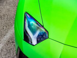 Preview wallpaper lamborghini, car, sports car, green, headlight