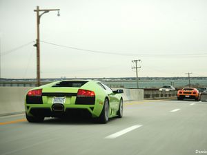 Preview wallpaper lamborghini, car, sports car, green, speed, road