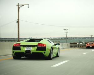 Preview wallpaper lamborghini, car, sports car, green, speed, road