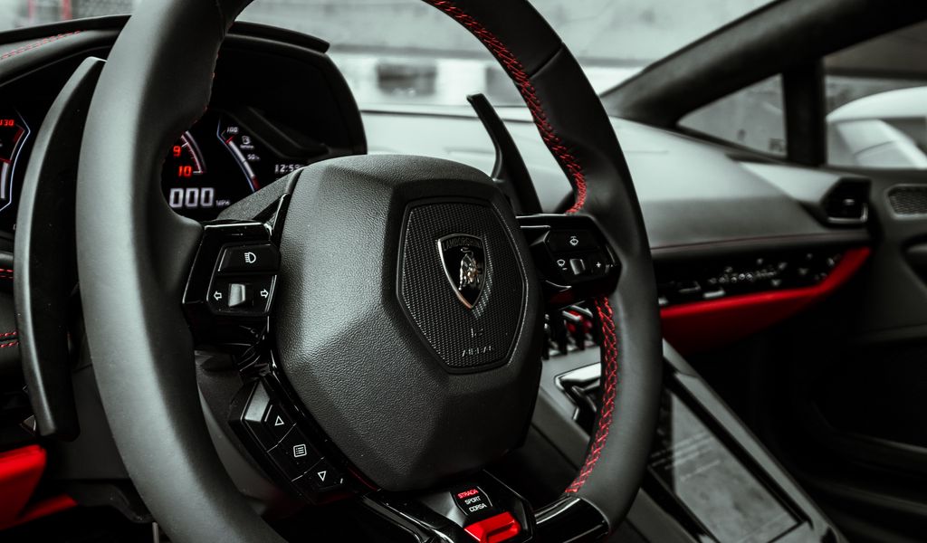 1024x600 Wallpaper lamborghini, car, steering wheel, salon, seat, red
