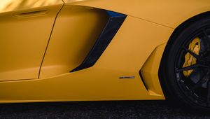 Preview wallpaper lamborghini, car, wheel, tire, yellow