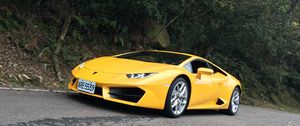 Preview wallpaper lamborghini, sports car, side view, yellow